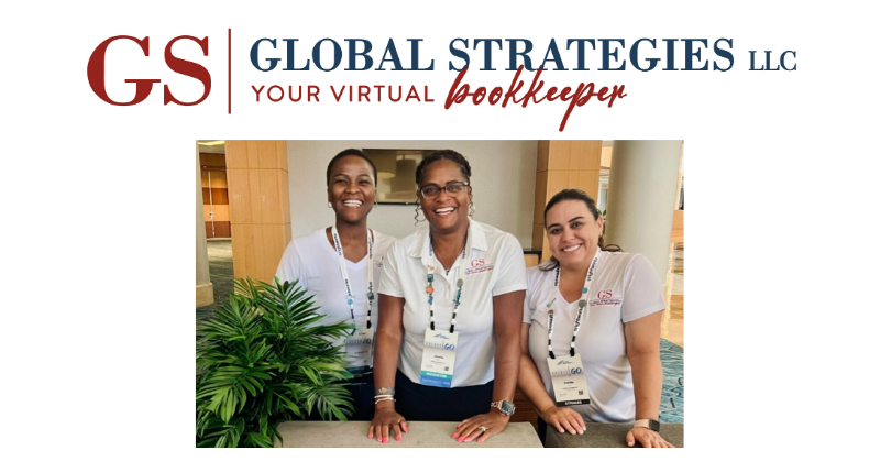 Three women in Global Strategies LLC polos stand smiling behind a table at a professional event, with the company logo above.