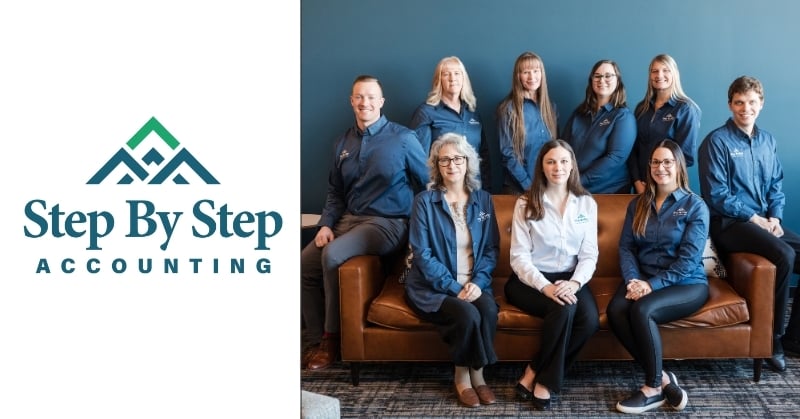 Group photo of the Step By Step Accounting team, featuring nine professionals in branded attire seated and standing around a brown leather couch against a blue wall. On the left side of the image is the Step By Step Accounting logo with green and navy mountain-themed iconography above the company name in bold text.