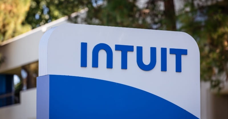 Intuit corporate sign outside an office building with blue and white branding.