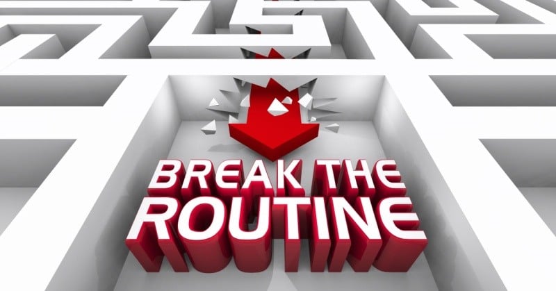 "Break the Routine" text in bold, red 3D letters breaking through a white maze wall with a large red arrow pointing downward, symbolizing small to mid-sized accounting firms breaking free from the cycle of routine tasks and embracing innovation.