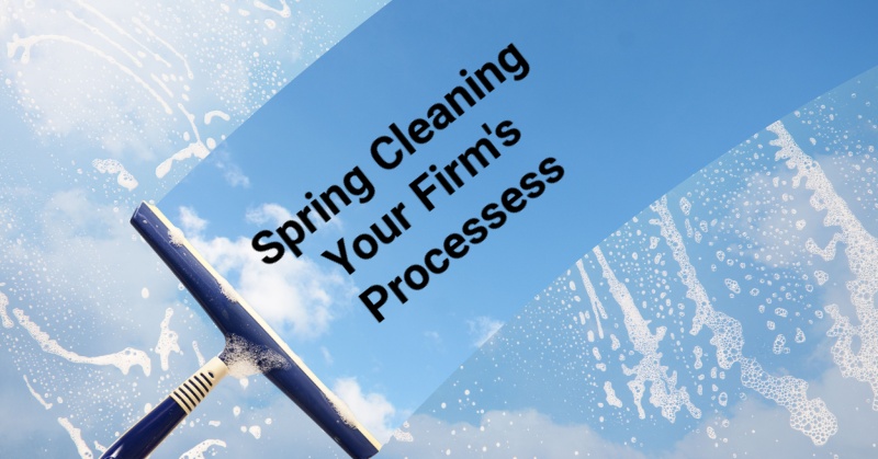 Soapy window being cleaned by squeegie with words "Spring Cleaning Your Firm's Processes"