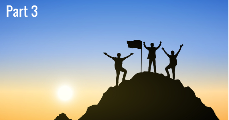 Leader and teammates on mountain top