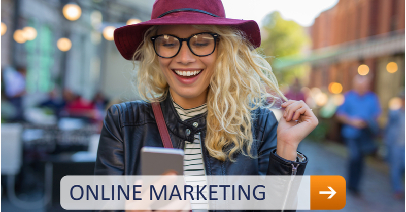Woman holding phone with caption of online marketing